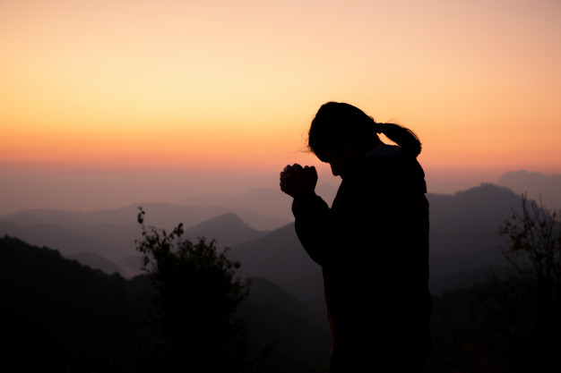 WOMAN PRAY