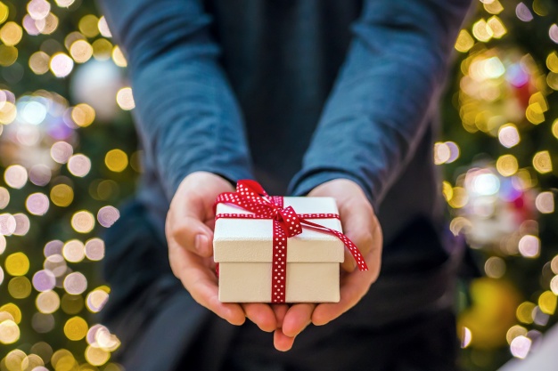 HANDS WITH GIFT